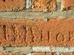 Photo of etched graffiti in brickwork 1